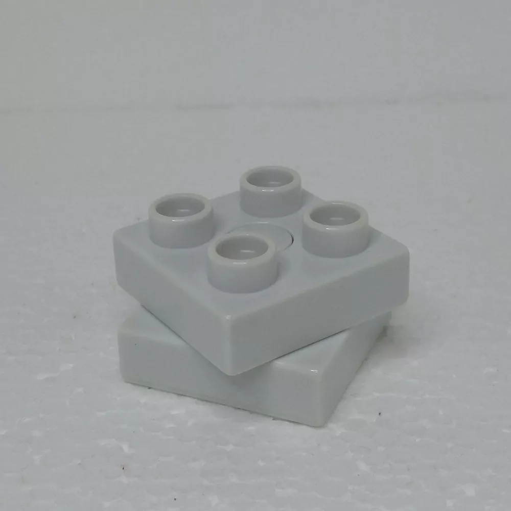Lego® Duplo® Otočná kostka 2x2 hranatá světlá