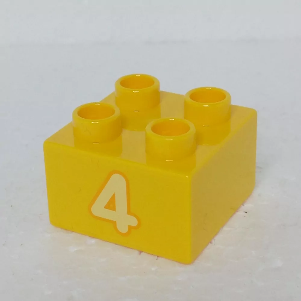Lego® Duplo® Kostka 2x2 potisk žluté číslo "4"